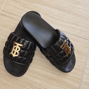 Burberry Black Slides with Embossed Logo